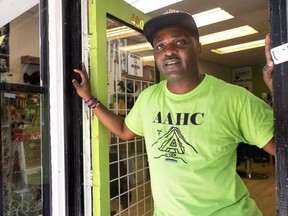 James Edwards, owner of AAHC Barbershop and Salon on Richmond Street, is one of a number of business owners preparing for their stores to be used as a setting for the filming of an Apple TV series called Improbable Valentine.
Photograph taken on Monday, Aug. 15, 2022. 
Mike Hensen/The London Free Press