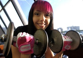 Laura Dennis, whose name is Cherry Bomb, keeps herself fit at The Athletic Club in this 2010 file photo. (Free press files)