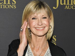 Olivia Newton-John attends the VIP reception for upcoming "Property of Olivia Newton-John Auction Event at Juliens Auctions on Oct. 29, 2019 in Beverly Hills, Calif.