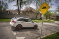 A vehicle drives over a speed bump in Windsor.   (Postmedia Network file photo)