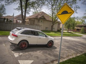 A vehicle drives over a speed bump in Windsor.   (Postmedia Network file photo)