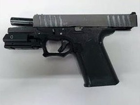 Two Sarnia residents and a youth from the Greater Toronto Area are being held in jail on weapons charges after Sarnia police say they seized an untraceable homemade gun while raiding a home. (Sarnia police)