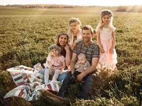 Heidi Schlumpf poses with her husband Remo and their kids Priska, 7, Daisy, 6, Alice, 4, and Konrad, 1. Heidi died from triple-negative metastatic breast cancer Aug. 10, but an inspirational fundraiser and social media campaign she launched in 2021 following her diagnosis are being continued by family and friends. (Contributed photo)