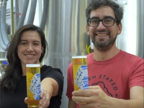 Brewer Diana Salazar and co-founder Justin Belanger raise a glass to Storm Stayed Brewing’s Lager than Life event. The celebration of lager beer styles happens Oct. 1. (Wayne Newton/Special to The Free Press)