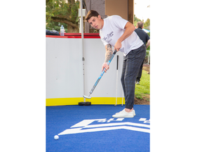 Using a modified putter, Toronto Maple Leafs forward Mitch Marner played host to the inaugural Sink The Stigma mini-putt tournament at East Park in London on Thursday September 15, 2022. The event raised funds for London Health Sciences Centre’s First Episode Mood & Anxiety Program (FEMAP). Derek Ruttan/The London Free Press