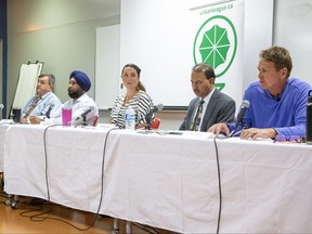 Bob Wright, left, Prabh Gill, Ainsley Graham, Saifullah Qasimi and Peter Cuddy take part in a Ward 3 all-candidates meeting at Beacock library branch in London on Thursday, Sept. 15, 2022. Derek Ruttan/The London Free Press
