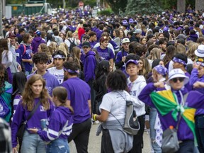 Thousands of students gather on Broughdale Avenue during Western University's homecoming weekend in London on Saturday, Sept. 24, 2022. (Derek Ruttan/The London Free Press)