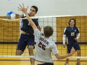 Wyatt Thompson of Parkside collegiate institute has lots of room beside Chris De Bruyn of South collegiate institute as the combined block doesn't get there in time during a Thames Valley senior boys volleyball game on Wednesday, Sept. 28, 2022, at South in London. Parkside won 3-1. Mike Hensen/The London Free Press