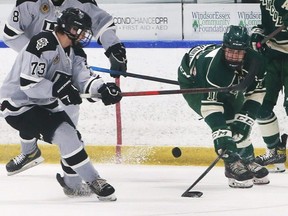 Connor Tucker, left, of the LaSalle Vipers and Kieran Moore of the St. Mary’s Lincolns battle for the puck on Sunday, April 10, 2022 at the Vollmer Centre in LaSalle. (Postmedia Network file photo)