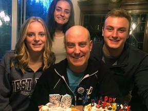 Jeff Scott, shown on his 50th birthday with his children, Maggie, Emma and Jackson, was killed in a collision at the end of his driveway in 2020. (Submitted photo)