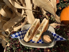 Western Fair's own Graze 'N Go Food Mobile trailer is offering the Atomic Grilled Cheese, stuffed with cream cheese jalapeno peppers, aged cheddar, bulgogi beef, sweet soy and chili aioli for $10. (JOE BELANGER/the London Free Press)
