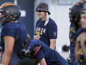 University of Windsor Lancers football team head coach Jean-Paul Circelli, centre, is shown during a practice. (Dan Janisse/Postmedia Network)