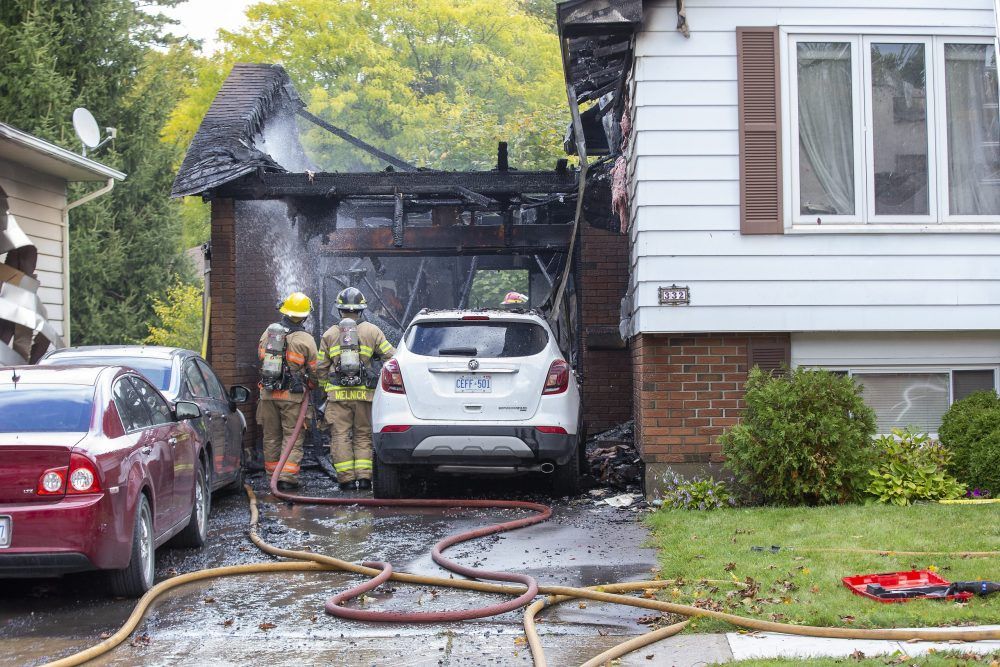 Quick escape saved three from windblown London house fire The