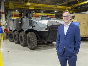 Steve Pietrangelo, director of engineering at General Dynamics Land Systems, poses with an armoured vehicle in London on Wednesday October 12, 2022. Derek Ruttan/The London Free Press/Postmedia Network