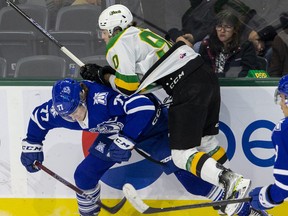 London Knights forward Landon Sim collides with  Mississauga Steelheads opponent Ethan Del Mastro during their game at Budweiser Gardens in London on Friday October 14, 2022. Derek Ruttan/The London Free Press/Postmedia Network
