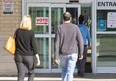 People enter the Reeves Community Complex where there was a polling station for the municipal election in Woodstock on Monday October 24, 2022. (Derek Ruttan/The London Free Press)