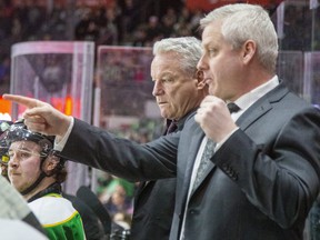 London Knights assistant coach Rick Steadman, foreground, and head coach Dale Hunter are shown behind the team's bench. (Mike Hensen/The London Free Press)