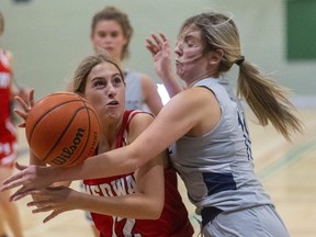 Medway’s Haley Chalmers gets fouled under the hoop by Parkside Collegiate’s Abigail Wipfler during their senior girls basketball game at Parkside in St. Thomas on Monday October 3, 2022. Parkside won the game, 35-25. Mike Hensen/The London Free Press