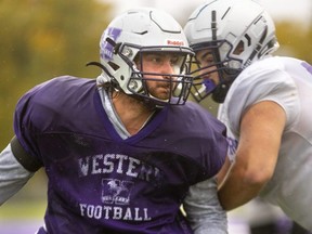 Western Mustangs defensive end Bruce Maas gets past the offensive line during practice Wednesday, Oct. 19, 2022, at Western Alumni Stadium. 
Mike Hensen/The London Free Press