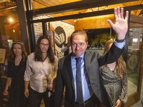 London mayor-elect Josh Morgan arrives at Toboggan Brewery for his campaign celebrations after a convincing victory on Monday, Oct. 24, 2022. With him is daughter Ainsley, 14, wife Melanie, son Max, 6, and daughter McKenna, 11, in London. (Mike Hensen/The London Free Press)