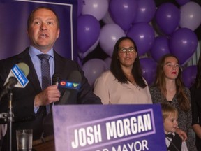 London mayor-elect Josh Morgan makes his victory speech Monday, Oct. 24, 2022, at the Toboggan Brewery. Morgan is flanked by his wife Melanie, son Max, 6, and daughters  McKenna, 11, and Ainsley 14. (Mike Hensen/The London Free Press)