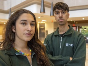 Firuza Huseynova and Chris Mohan are part of a group of Ivey Business School students at Western University who wrote an open letter about the school honouring Dave McKay, CEO of Royal Bank of Canada, as a business leader despite what they say is his lack of leadership on environmental issues. (Mike Hensen/The London Free Press)