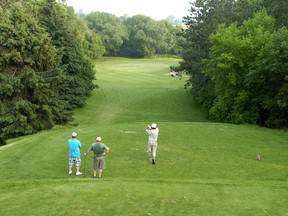 Golfers are shown on the former River Road golf course, which was owned and operated by city hall, in east London. (File photo)