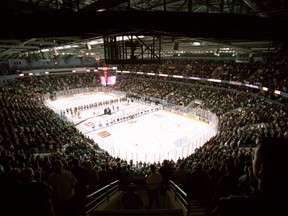 A sellout crowd of 9,140 stands for the national anthems before the London Knights home opener against the Plymouth Whalers, the first event in the John Labatt Centre, on Oct. 12, 2022. (Free Press files)