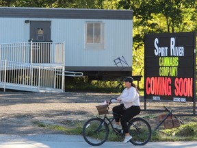 A sign outside Spirit River Cannabis Company says it's opening soon in a Wellington Road parking lot, just north of Grand Avenue. (Dale Carruthers/The London Free Press)