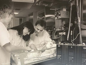 Parents check in on their child in this undated photo from the archives of Children's Hospital which turns 100 on Oct. 29. Supplied