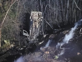 A stolen pickup started a fire that spread to trees and an outbuilding after its driver went through the end of Kitchigami Road in Huron County and down an embankment. Huron OPP Twitter photo