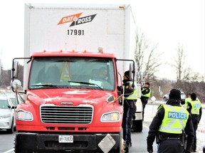 Middlesex OPP set up a RIDE checkpoint on the Highway 402 off-ramp at Colonel Talbot Road on Thursday, Nov. 17, 2022, to kick off the annual holiday campaign against impaired driving.  (DALE CARRUTHERS/The London Free Press)