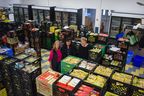 St. Thomas-Elgin Food Bank members Sarah Coleman, Karen McDade and Kim McCaw say demand for the food bank's services has risen to an all-time high as more households feel inflation.  (Calvi Leon/The London Free Press)