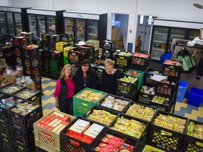 St. Thomas-Elgin Food Bank members Sarah Coleman, Karen McDade, and Kim McCaw say demand for the food bank's services has surged to an all-time high as more households are feeling the pinch of inflation. (Calvi Leon/The London Free Press)