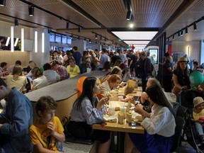 Vkusno & tochka, the Russian version of McDonald's that took over after McDonald's Corp. pulled out of the market after the invasion of Ukraine, does a brisk business as it reopens in June. (Evgenia Novozhenina/Reuters)