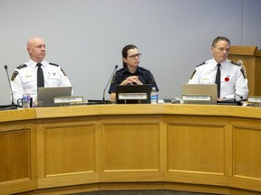 From left, Deputy Chiefs Stu Betts and Trish McIntyre sit with Chief Steve Williams during a London Police Services Board meeting in London on Monday November 7, 2022. (Derek Ruttan/The London Free Press)