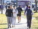 Students make their way to and from class at Western University in London on Tuesday, Nov. 8, 2022. (Derek Ruttan/The London Free Press)
