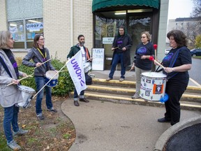 The UWOFA Beats Collective plays music outside of the University of Western Ontario Faculty Association strike headquarters in London on Friday Nov. 11, 2022. Western faculty are poised to strike on Tuesday. (Derek Ruttan/The London Free Press)