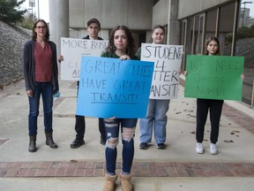 Western University assistant professor of geography and environment Carol Hunsberger, left, and students William Mitchell, Christine Taylhardat, Dana Bakker and Adelle Rhuman. are calling for better service from the London Transit in light of the climate crisis. (Derek Ruttan/The London Free Press)