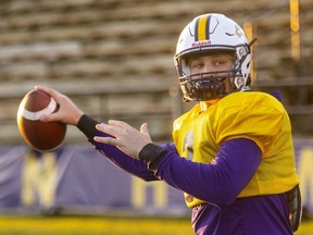 Taylor Elgersma, an Oakridge secondary school grad, warms up for practice at Wilfrid Laurier University on Wednesday, Nov. 2, 2022. Elgersma passed for more than 300 yards against Carleton last week in an OUA quarterfinal win and will be gunning to take out Western in a semifinal Saturday at Western Alumni Stadium. (Mike Hensen/The London Free Press)