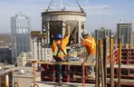 Rob Macgillivray and Dylan Churchill for the walls of the 23rd floor at 131 King St. in London, Ont., on Friday, Nov. 4, 2022. The York Developments tower directly across from the Covent Garden Market will top out at 31 floors, with more than 260 units.  (Mike Hensen/The London Free Press)