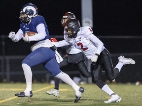A huge run by Laurier Rams player Brian Bennett ended just short of a touchdown in the WOSSAA senior football championship game at St. Thomas Aquinas, played at London's City Wide field on Friday Nov. 18, 2022. Laurier won, 24-14. (Mike Hensen/The London Free Press)