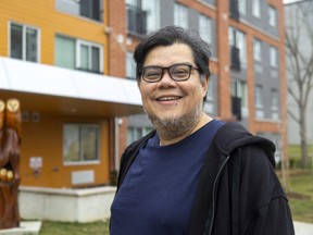 Colombian immigrant Javier Castro says he and his family are "very lucky" to land a new home at 122 Base Line Rd. W., a 61-unit affordable housing building constructed as part of London's rapid housing initiative.  (Mike Hensen/The London Free Press)