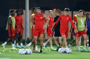 Canada's Lucas Cavallini and his teammates train ahead of their first match at the 2022 World Cup in Qatar.  Photo taken Tuesday November 22, 2022. REUTERS/Siphiwe Sibeko