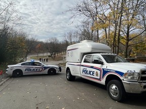 London police cordoned off a section of Gibbons Park near the Grosvenor Street entrance on Sunday Nov. 6, 2022. The department's major crime unit is investigating after a male was found unresponsive in the area shortly before 7 a.m. and later pronounced dead. (Jennifer Bieman/The London Free Press)