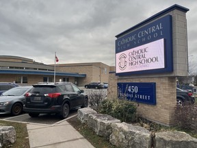 London police say they are increasing their presence at London's Catholic Central high school after "graffiti-style" threats of violence at the school earlier in the week. Still, half the student body did not attend classes on Friday. (Jennifer Bieman/The London Free Press)