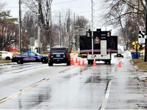 Chatham-Kent police closed a section of Murray Street in Wallaceburg while they investigate a shooting on Friday, Dec. 30, 2022, that injured a 42-year-old man. (Trevor Terfloth/The Daily News)