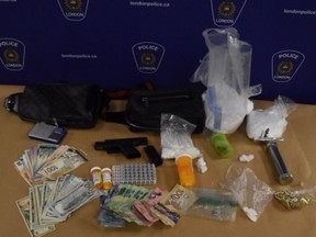 Three London residents face charges after police seized a handgun, ammunition, drugs, cash and other items from a vehicle and a home on Lemieux Walk on Wednesday, police said. (London police photo)