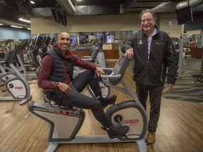 Vito Frijia, right, and Damian Warner are reopening the two former Movati Athletic fitness clubs in London under the name Damian Warner Fitness Centre. Photo shot in London on Tuesday, Dec. 6, 2022. Derek Ruttan/The London Free Press