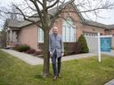 Realtor Phil Bailey, in front of 2025 Meadowgate Blvd.  in London on Monday, Dec.  12, 2022, says home buyers can get more houses for less money in the London area, because interest rates have moderated demand.  (Derek Ruttan/The London Free Press)